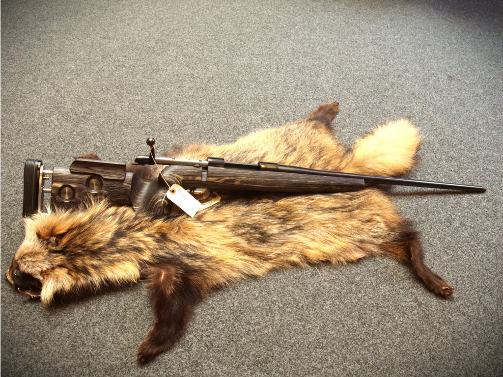 Brugt SAKO AV Hunter 300 win mag super flot og iorden, med grs skæfte i laminat og  stalon dæmper